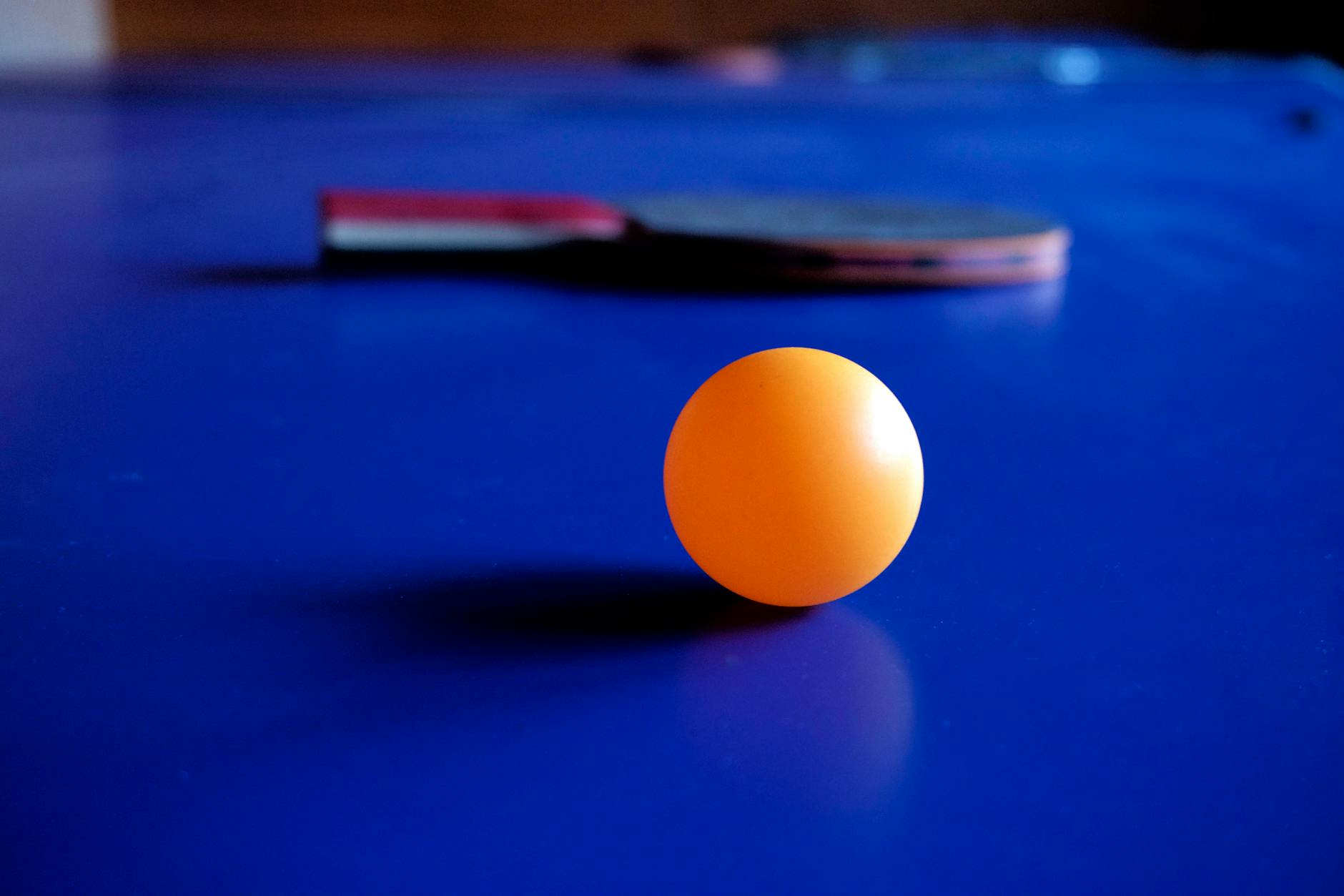 orange ping pong ball
